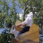 Toni getting a swarm in a skip loader